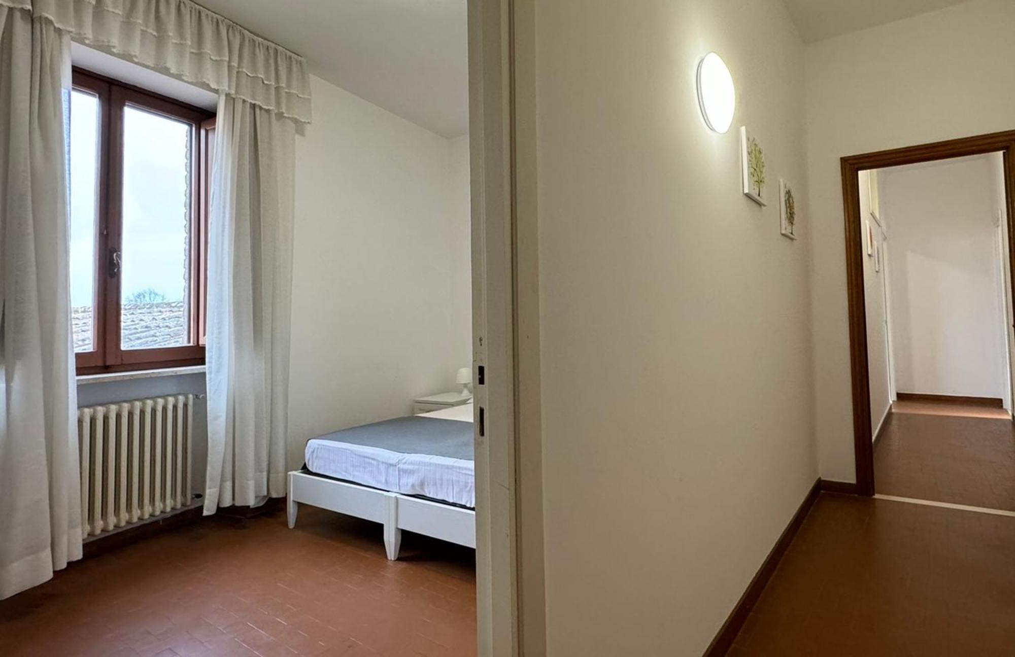 Monastero Ss. Annunziata Hotel Todi Buitenkant foto A typical bedroom in the residence halls